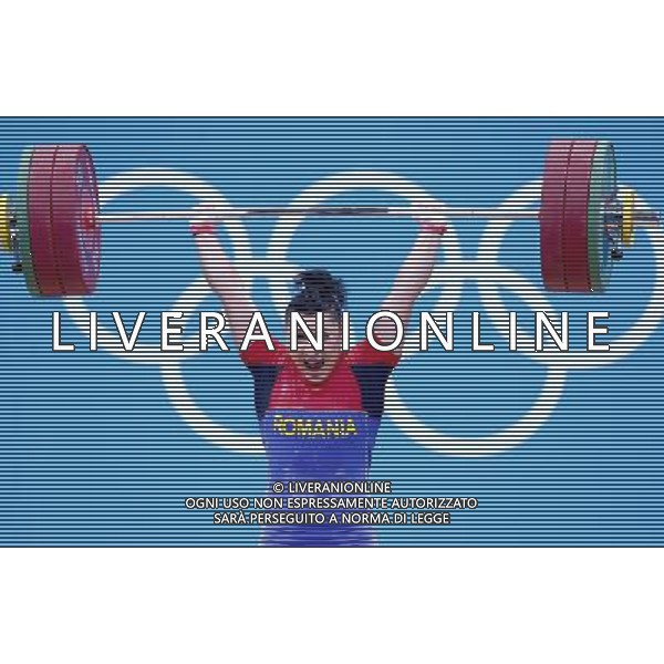(120801) -- LONDON, Aug. 1, 2012 () -- Roxana Daniela Cocos of Romania competes during the women\'s 69kg weightlifting event at London 2012 Olympic Games, London, Britain, Aug. 1, 2012. Roxana Daniela Cocos won the silver medal of the event with a total of 256kg. (/Chen Jianli) /ALDO LIVERANI SAS-ITALY ONLY - EDITORIAL USE ONLY