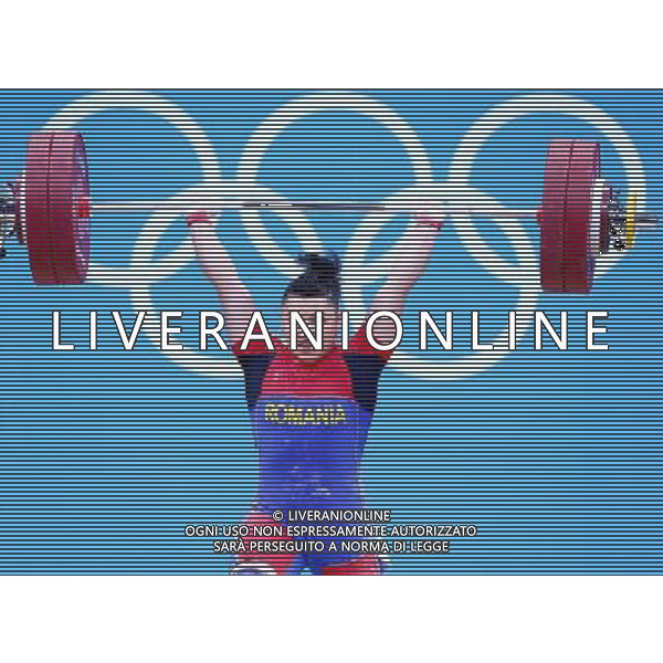 (120801) -- LONDON, Aug. 1, 2012 () -- Roxana Daniela Cocos of Romania competes during the women\'s 69kg weightlifting event at London 2012 Olympic Games, London, Britain, Aug. 1, 2012. Roxana Daniela Cocos won the silver medal of the event with a total of 256kg. (/Chen Jianli) /ALDO LIVERANI SAS-ITALY ONLY - EDITORIAL USE ONLY