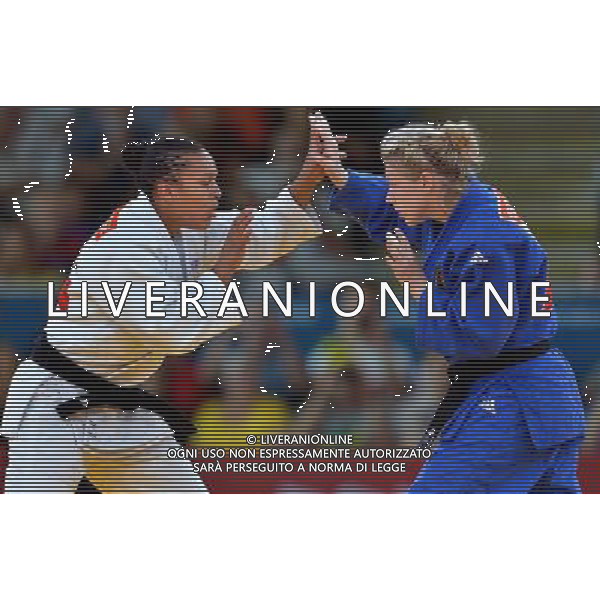 (120801) -- LONDON, Aug. 1, 2012 () -- Lucie Decosse of France (in white) competes with Kerstin Thiele of Germany during women\'s Judo 70kg gold medal contest, at London 2012 Olympic Games in London, Britain, on August 1, 2012. Lucie Decosse of France won. (/Chen Xiaowei) (nxl) /ALDO LIVERANI SAS-ITALY ONLY - EDITORIAL USE ONLY