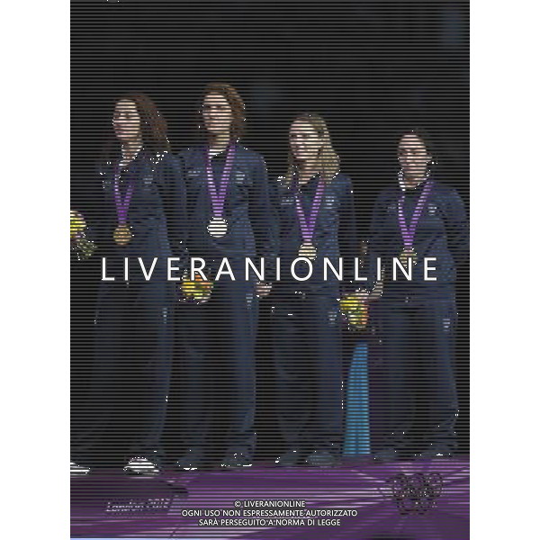 Londra, 02/08/2012. XXXÁ Giochi Olimpici di Londra- Vezzali, Di Francisca, Errigo e Salvatori vincono l\'oro nel fioretto a squadre nella foto: Vezzali, Di Francisca, Errigo e Salvatori Foto di Gabriele Forzano / GMT /AG ALDO LIVERANI SAS