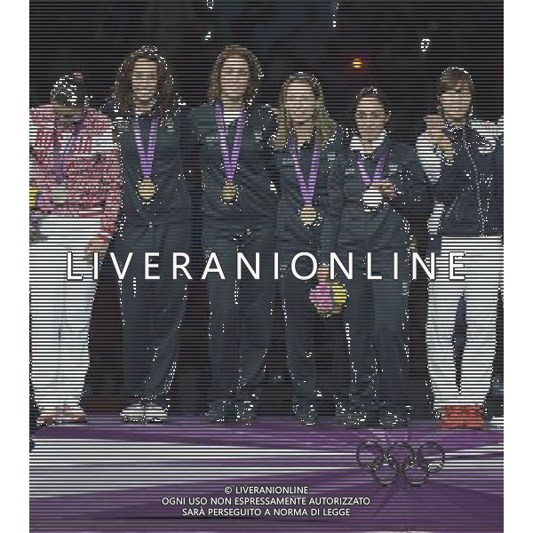 Londra, 02/08/2012. XXXÁ Giochi Olimpici di Londra- Vezzali, Di Francisca, Errigo e Salvatori vincono l\'oro nel fioretto a squadre nella foto: Vezzali, Di Francisca, Errigo e Salvatori Foto di Gabriele Forzano / GMT /AG ALDO LIVERANI SAS
