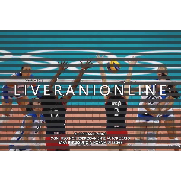 (120801) -- LONDON, Aug. 1, 2012 () -- Lucy Wicks (R, front) and Elizabeth Reid (L, front) of Britain blocks the ball during the women\'s volleyball match between Britain and Italy at London 2012 Olympic Games, London, Britain, Aug. 1, 2012. Britain lost the match 0-3. (/Jin Liwang) /PHOTOSHOT/ALDO LIVERANI ITALY ONLY -