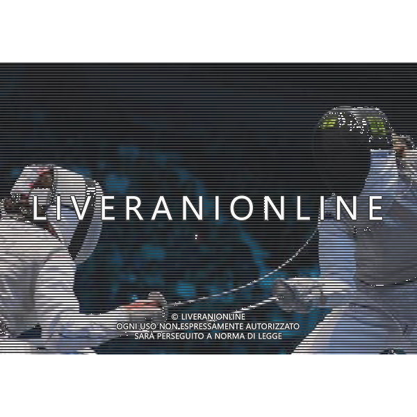 (120802) -- LONDON, Aug. 2, 2012 () -- Valentina Vezzali (R) of Italy competes with Ysaora Thibus of France during women\'s team foil semifinal match of fencing at London 2012 Olympic Games in London, Britain, August 2, 2012. Italy defeated France 45-22 and entered the final. (/Zeng Yi) (zgp) /PHOTOSHOT/ALDO LIVERANI ITALY ONLY -