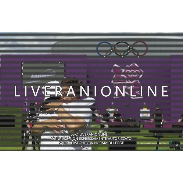 (120802) -- LONDON, Aug. 2, 2012 () -- Ki Bo Bae (L) of South Korea celebrates with her coach after women\'s individual final of archery event, at London 2012 Olympic Games in London, Britain, August 2, 2012. Ki Bo Bae won the gold medal. (/Tao Xiyi) (zgp) /PHOTOSHOT/ALDO LIVERANI ITALY ONLY -