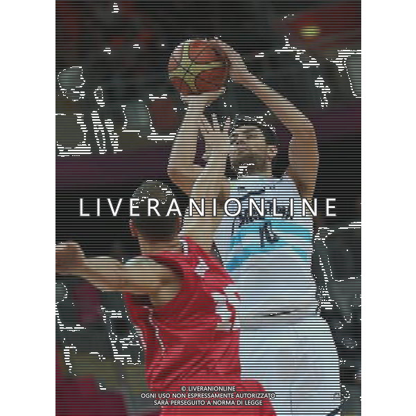 (120802) -- LONDON, Aug. 2, 2012 () -- Players compete during men\'s basketball preliminary round group A contest between Argentina and Tunisia, at London 2012 Olympic Games in London, Britain, on August 2, 2012. Argentina won 92-69. (/Meng Yongmin) (nxl) /PHOTOSHOT/ALDO LIVERANI ITALY ONLY -