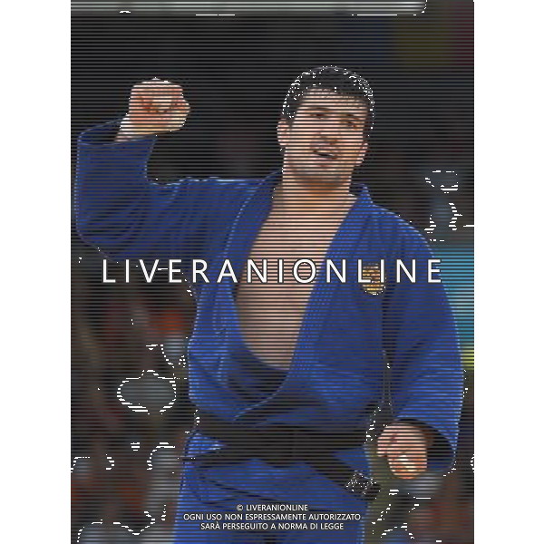 (120802) -- LONDON, Aug. 2, 2012 () -- Tagir Khaibulaev of Russia celebrates after defeating Tuvshinbayar Naidan of Mongolia during the gold medal match of men\'s 100kg judo event at London 2012 Olympic Games, London, Britain, Aug. 2, 2012. Tagir Khaibulaev of Russia won the match and claimed the gold medal of the event. (/Wang Qingqin) /PHOTOSHOT/ALDO LIVERANI ITALY ONLY -