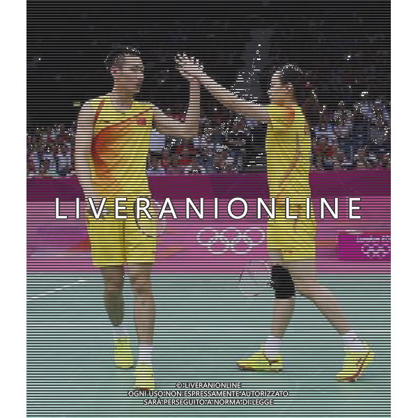 (120802) -- LONDON, Aug. 2, 2012 () -- Zhang Nan/Zhao Yunlei of China compete during badminton mixed doubles semifinal match, at London 2012 Olympic Games in London, Britain, on August 2, 2012. Zhang Nan/Zhao Yunlei of China defeated Joachim Fischer/Christinna Pedersen of Denmark 2-1. (/Tang Shi) (nxl) /PHOTOSHOT/ALDO LIVERANI ITALY ONLY -