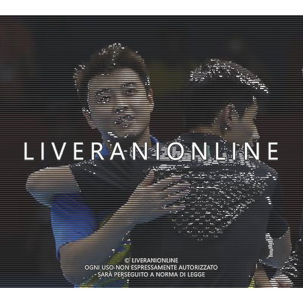 (120802) -- LONDON, Aug. 2, 2012 () -- Gold medalist Zhang Jike of China (in black) hugs silver medalist Wang Hao of China after men\'s table tennis singles final match, at London 2012 Olympic Games in London, Britain, on August 2, 2012. Zhang Jike of China won gold medal. (/Shen Bohan) (nxl) /PHOTOSHOT/ALDO LIVERANI ITALY ONLY -