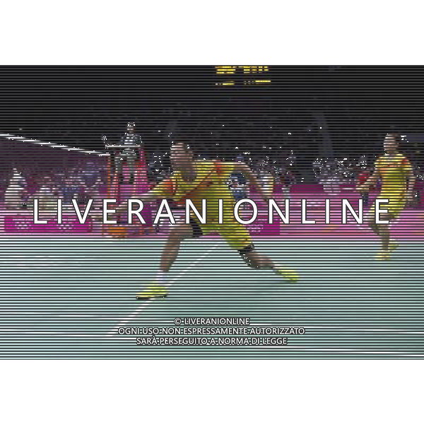 (120802) -- LONDON, Aug. 2, 2012 () -- Xu Chen (front) and Ma Jin of China competes during the semifinals match of mixed doubles badminton event against Tontowi Ahmad and Liliyana Natsir of Indonesia at London 2012 Olympic Games, London, Britain, Aug. 2, 2012. Xu Chen/Ma Jin won the match 2-1. (/Tang Shi) /PHOTOSHOT/ALDO LIVERANI ITALY ONLY -