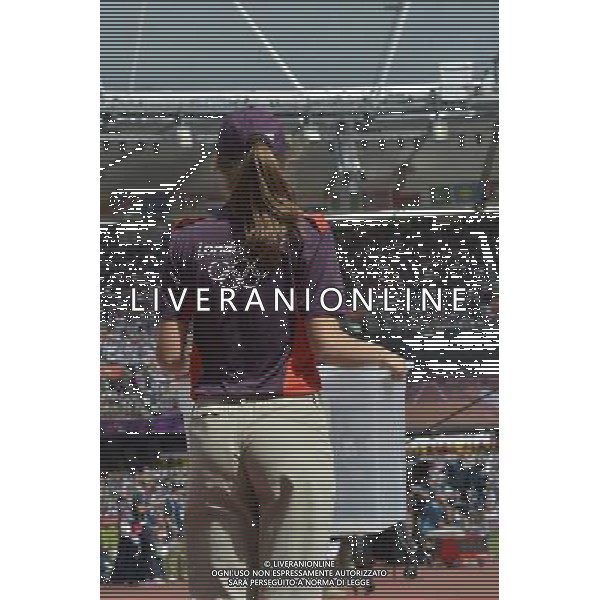 Games Maker with empty box for Athletes clothing. Olympic Stadium, Olympic Park Stratford. London. ©PHOTOSHOT/Agenzia Aldo Liverani Sas - ITALY ONLY - GIOCHI OLIMPICI, OLIMPIADI LONDRA 2012
