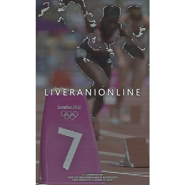 Lane Marker and Christine Ohuruogu leaving starting blocks. Olympic Stadium, Olympic Park Stratford. London. ©PHOTOSHOT/Agenzia Aldo Liverani Sas - ITALY ONLY - GIOCHI OLIMPICI, OLIMPIADI LONDRA 2012