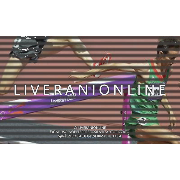 Athletes clear the barrier in the men\'s 3000m steeplechase. Olympic Stadium, Olympic Park Stratford. London. ©PHOTOSHOT/Agenzia Aldo Liverani Sas - ITALY ONLY - GIOCHI OLIMPICI, OLIMPIADI LONDRA 2012