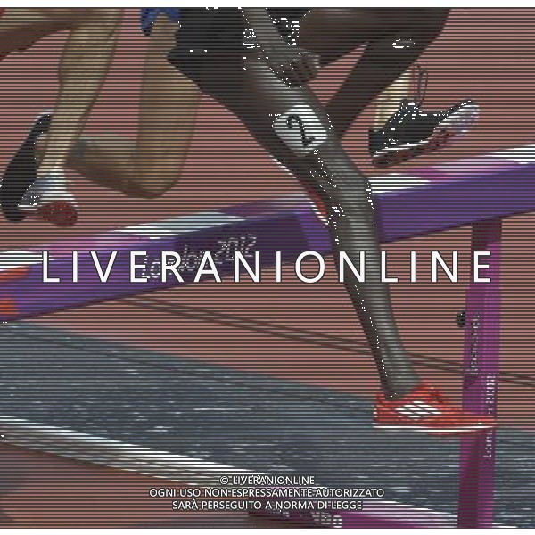 Athletes clear the barrier in the men\'s 3000m steeplechase. Olympic Stadium, Olympic Park Stratford. London. ©PHOTOSHOT/Agenzia Aldo Liverani Sas - ITALY ONLY - GIOCHI OLIMPICI, OLIMPIADI LONDRA 2012