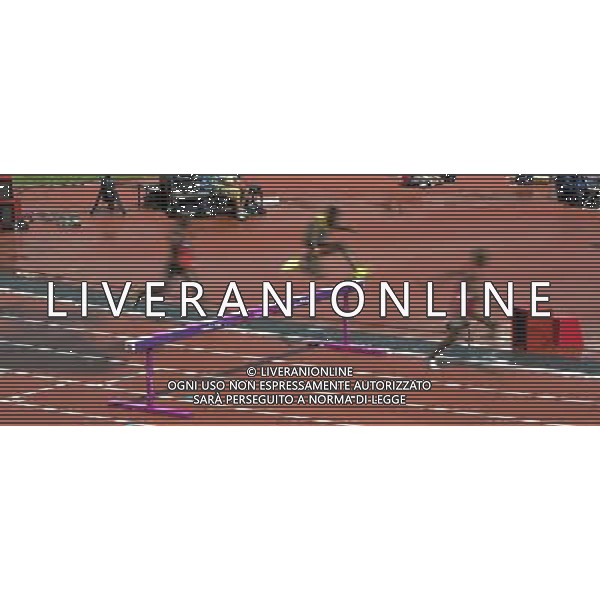 Athletes clearing a Barrier during the men\'s 3000m steeplechase. Olympic Stadium, Olympic Park Stratford. London. ©PHOTOSHOT/Agenzia Aldo Liverani Sas - ITALY ONLY - GIOCHI OLIMPICI, OLIMPIADI LONDRA 2012