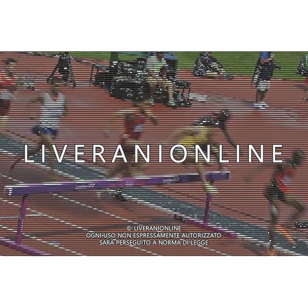 Athletes clearing a Barrier during the men\'s 3000m steeplechase. Olympic Stadium, Olympic Park Stratford. London. ©PHOTOSHOT/Agenzia Aldo Liverani Sas - ITALY ONLY - GIOCHI OLIMPICI, OLIMPIADI LONDRA 2012