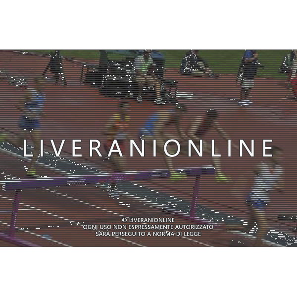 Athletes clearing a Barrier during the men\'s 3000m steeplechase. Olympic Stadium, Olympic Park Stratford. London. ©PHOTOSHOT/Agenzia Aldo Liverani Sas - ITALY ONLY - GIOCHI OLIMPICI, OLIMPIADI LONDRA 2012