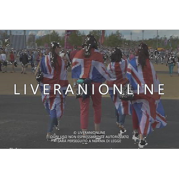 Women with Union flags wrapped round them, Olympic Park in Stratford London ©PHOTOSHOT/Agenzia Aldo Liverani Sas - ITALY ONLY - GIOCHI OLIMPICI, OLIMPIADI LONDRA 2012