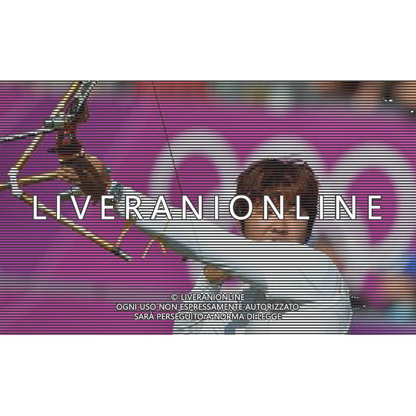 (120803) -- LONDON, Aug. 3, 2012 () -- Im Dong Hyun of South Korea competes during men\'s archery individual 1/8 eliminations contest, at London 2012 Olympic Games in London, Britain, on August 3, 2012. Im Dong Hyun of South Korea lost to Rick van der Ven of the Netherlands 1-7. (/Gesang Dawa) (nxl) ©PHOTOSHOT/Agenzia Aldo Liverani Sas - ITALY ONLY - GIOCHI OLIMPICI, OLIMPIADI LONDRA 2012