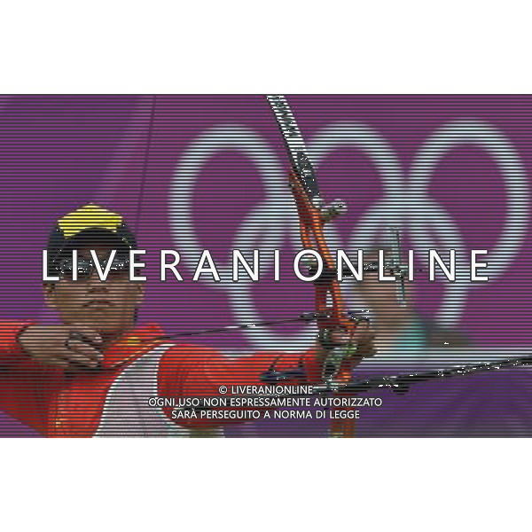 (120803) -- LONDON, Aug. 3, 2012 () -- Dai Xiaoxiang of China takes part in men\'s archery individual 1/8 eliminations contest, at London 2012 Olympic Games in London, Britain, on August 3, 2012. Dai Xiaoxiang of China defeated Taylor Worth of Australia. (/Gesang Dawa) (nxl) ©PHOTOSHOT/Agenzia Aldo Liverani Sas - ITALY ONLY - GIOCHI OLIMPICI, OLIMPIADI LONDRA 2012