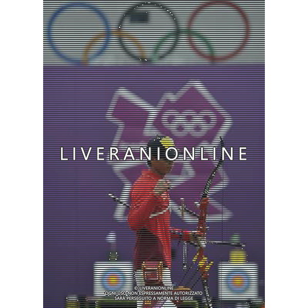 (120803) -- LONDON, Aug. 3, 2012 () -- Dai Xiaoxiang of China takes part in men\'s archery individual 1/8 eliminations contest, at London 2012 Olympic Games in London, Britain, on August 3, 2012. Dai Xiaoxiang of China defeated Taylor Worth of Australia. (/Gesang Dawa) (nxl) ©PHOTOSHOT/Agenzia Aldo Liverani Sas - ITALY ONLY - GIOCHI OLIMPICI, OLIMPIADI LONDRA 2012