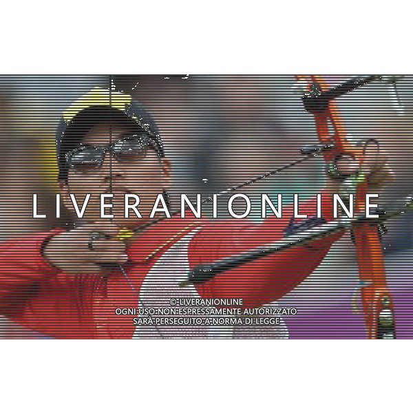 (120803) -- LONDON, Aug. 3, 2012 () -- Dai Xiaoxiang of China takes part in men\'s archery individual 1/8 eliminations contest, at London 2012 Olympic Games in London, Britain, on August 3, 2012. Dai Xiaoxiang of China defeated Taylor Worth of Australia. (/Gesang Dawa) (nxl) ©PHOTOSHOT/Agenzia Aldo Liverani Sas - ITALY ONLY - GIOCHI OLIMPICI, OLIMPIADI LONDRA 2012
