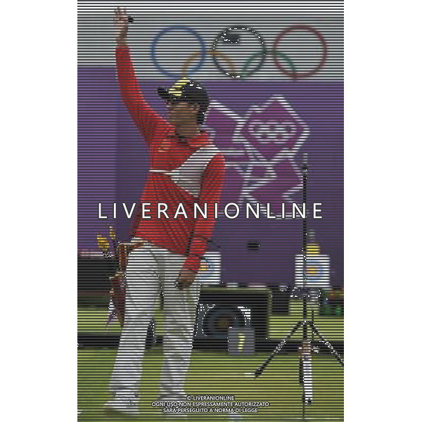 (120803) -- LONDON, Aug. 3, 2012 () -- Dai Xiaoxiang of China takes part in men\'s archery individual 1/8 eliminations contest, at London 2012 Olympic Games in London, Britain, on August 3, 2012. Dai Xiaoxiang of China defeated Taylor Worth of Australia. (/Gesang Dawa) (nxl) ©PHOTOSHOT/Agenzia Aldo Liverani Sas - ITALY ONLY - GIOCHI OLIMPICI, OLIMPIADI LONDRA 2012