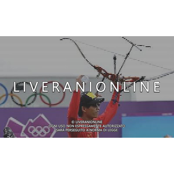 (120803) -- LONDON, Aug. 3, 2012 () -- Dai Xiaoxiang of China takes part in men\'s archery individual 1/8 eliminations contest, at London 2012 Olympic Games in London, Britain, on August 3, 2012. Dai Xiaoxiang of China defeated Taylor Worth of Australia. (/Gesang Dawa) (nxl) ©PHOTOSHOT/Agenzia Aldo Liverani Sas - ITALY ONLY - GIOCHI OLIMPICI, OLIMPIADI LONDRA 2012