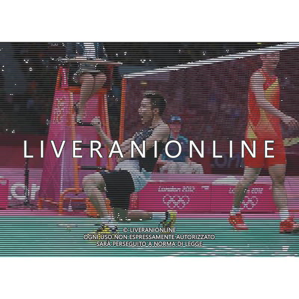 (120803) -- LONDON, Aug. 3, 2012 () -- Lee Chong Wei of Malaysia (L) celebrates after defeating Chen Long of China (R) during the men\'s singles semifinal match of badminton event at London 2012 Olympic Games, London, Britain, Aug. 3, 2012. Lee Chong Wei won the match and advanced to the final. (/Ren Zhenglai) ©PHOTOSHOT/Agenzia Aldo Liverani Sas - ITALY ONLY - GIOCHI OLIMPICI, OLIMPIADI LONDRA 2012