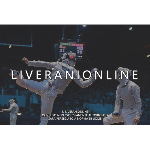 (120803) -- LONDON, Aug. 3, 2012 () -- Zhong Man of China (R) competes with Tiberiu Dolniceanu of Romania during men\'s fencing sabre team quarterfinal contest, at London 2012 Olympic Games in London, Britain, on August 3, 2012. Romania won 45-30. (/Zeng Yi) (nxl) ©PHOTOSHOT/Agenzia Aldo Liverani Sas - ITALY ONLY - GIOCHI OLIMPICI, OLIMPIADI LONDRA 2012