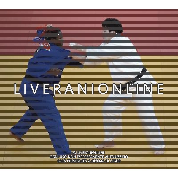 (120803) -- LONDON, Aug. 3, 2012 () -- Tong Wen of China (in white) competes with Idalys Ortiz of Cuba during women\'s Judo +78kg semifinal contest, at London 2012 Olympic Games in London, Britain, on August 3, 2012. Tong Wen of China lost to Idalys Ortiz of Cuba. (/Guo Yong) (nxl) ©PHOTOSHOT/Agenzia Aldo Liverani Sas - ITALY ONLY - GIOCHI OLIMPICI, OLIMPIADI LONDRA 2012