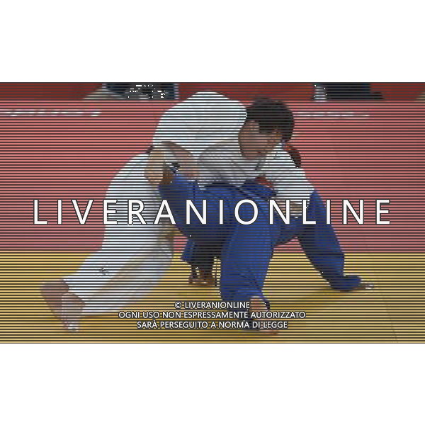 (120803) -- LONDON, Aug. 3, 2012 () -- Tong Wen of China (in white) competes with Idalys Ortiz of Cuba during women\'s Judo +78kg semifinal contest, at London 2012 Olympic Games in London, Britain, on August 3, 2012. Tong Wen of China lost to Idalys Ortiz of Cuba. (/Wu Xiaoling) (nxl) ©PHOTOSHOT/Agenzia Aldo Liverani Sas - ITALY ONLY - GIOCHI OLIMPICI, OLIMPIADI LONDRA 2012