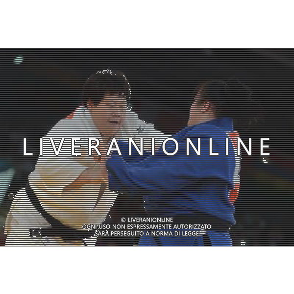 (120803) -- LONDON, Aug. 3, 2012 () -- Tong Wen of China (in white) competes with Iryna Kindzerska of Ukraine during women\'s Judo +78kg quarterfinal contest, at London 2012 Olympic Games in London, Britain, on August 3, 2012. Tong Wen of China won. (/Wang Qingqin) (nxl) ©PHOTOSHOT/Agenzia Aldo Liverani Sas - ITALY ONLY - GIOCHI OLIMPICI, OLIMPIADI LONDRA 2012