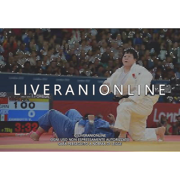 (120803) -- LONDON, Aug. 3, 2012 () -- Tong Wen of China (in white) competes with Vanessa Zambotti of Mexico during women\'s Judo +78kg elimination round of 32 contest, at London 2012 Olympic Games in London, Britain, on August 3, 2012. Tong Wen of China won. (/Wang Qingqin) (nxl) ©PHOTOSHOT/Agenzia Aldo Liverani Sas - ITALY ONLY - GIOCHI OLIMPICI, OLIMPIADI LONDRA 2012