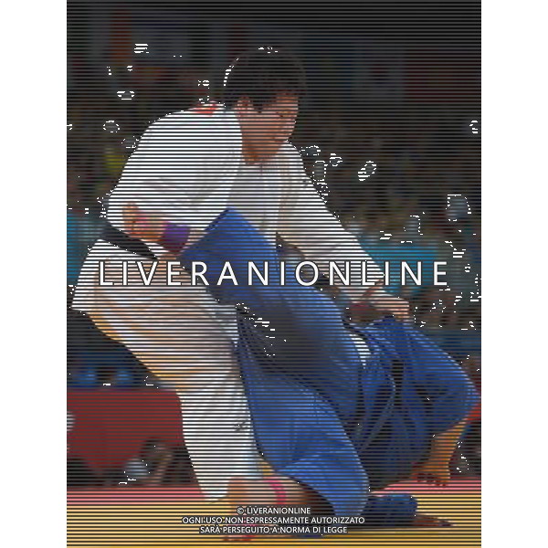 (120803) -- LONDON, Aug. 3, 2012 () -- Tong Wen of China (in white) competes with Vanessa Zambotti of Mexico during women\'s Judo +78kg elimination round of 32 contest, at London 2012 Olympic Games in London, Britain, on August 3, 2012. Tong Wen of China won. (/Wang Qingqin) (nxl) ©PHOTOSHOT/Agenzia Aldo Liverani Sas - ITALY ONLY - GIOCHI OLIMPICI, OLIMPIADI LONDRA 2012