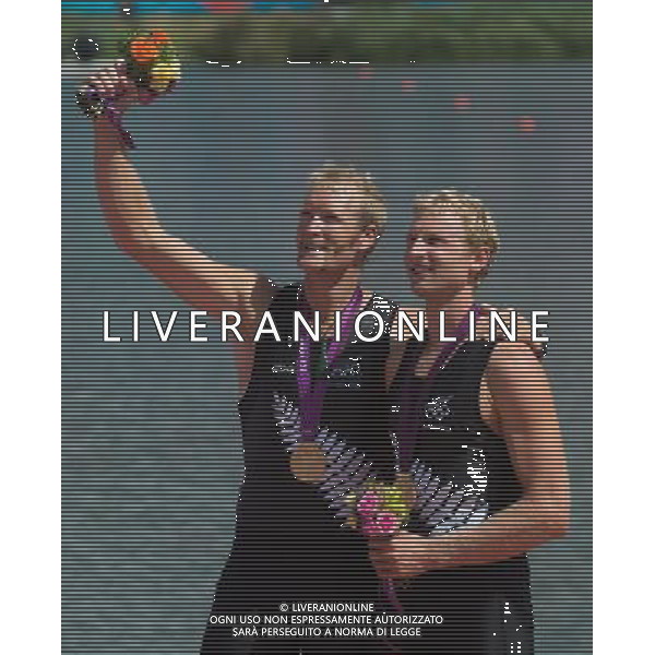 (120803) -- LONDON, Aug. 3, 2012 () -- Gold medalists Eric Murray and Hamish Bond of New Zealand celebrate during victory ceremony of men\'s pair competition of rowing event, at London 2012 Olympic Games in London, Britain, on August 3, 2012. (/Cheng Min) (nxl) ©PHOTOSHOT/Agenzia Aldo Liverani Sas - ITALY ONLY - GIOCHI OLIMPICI, OLIMPIADI LONDRA 2012