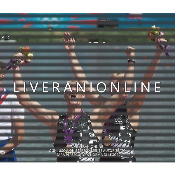 (120803) -- LONDON, Aug. 3, 2012 () -- Gold medalists Eric Murray and Hamish Bond of New Zealand celebrate during victory ceremony of men\'s pair competition of rowing event, at London 2012 Olympic Games in London, Britain, on August 3, 2012. (/Cheng Min) (nxl) ©PHOTOSHOT/Agenzia Aldo Liverani Sas - ITALY ONLY - GIOCHI OLIMPICI, OLIMPIADI LONDRA 2012