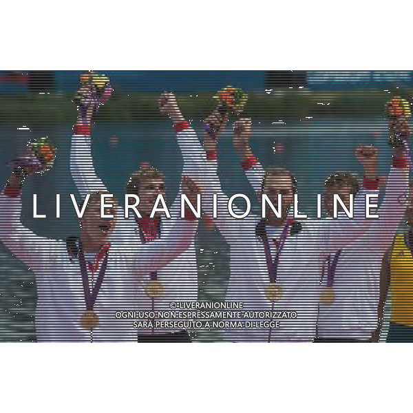 (120803) -- LONDON, Aug. 3, 2012 () -- Members of the German team celebrate during victory ceremony of men\'s quadruple sculls competition of rowing event, at London 2012 Olympic Games in London, Britain, on August 3, 2012. The German team won gold medal. (/Cheng Min) (nxl) ©PHOTOSHOT/Agenzia Aldo Liverani Sas - ITALY ONLY - GIOCHI OLIMPICI, OLIMPIADI LONDRA 2012
