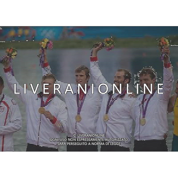 (120803) -- LONDON, Aug. 3, 2012 () -- Members of the German team celebrate during victory ceremony of men\'s quadruple sculls competition of rowing event, at London 2012 Olympic Games in London, Britain, on August 3, 2012. The German team won gold medal. (/Cheng Min) (nxl) ©PHOTOSHOT/Agenzia Aldo Liverani Sas - ITALY ONLY - GIOCHI OLIMPICI, OLIMPIADI LONDRA 2012