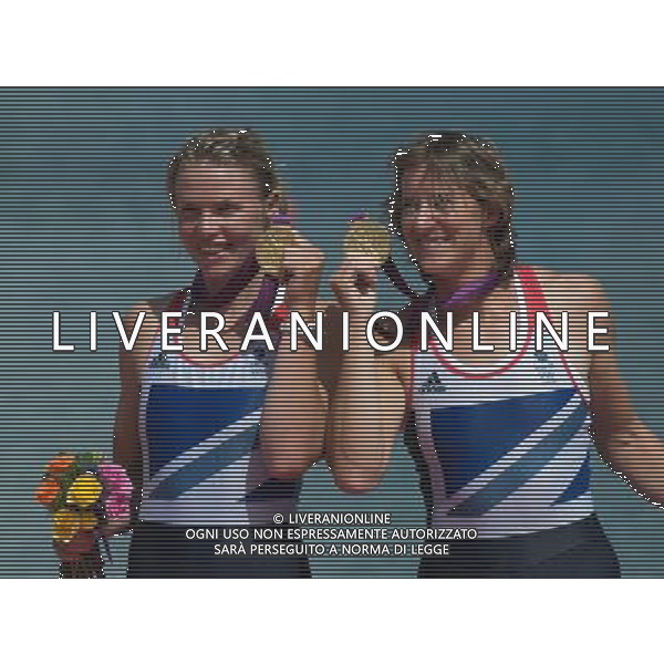 (120803) -- LONDON, Aug. 3, 2012 () -- Gold medalists Katherine Grainger and Anna Watkins of Britain pose during victory ceremony of women\'s double sculls competition of rowing event, at London 2012 Olympic Games in London, Britain, on August 3, 2012. (/Cheng Min) (nxl) ©PHOTOSHOT/Agenzia Aldo Liverani Sas - ITALY ONLY - GIOCHI OLIMPICI, OLIMPIADI LONDRA 2012