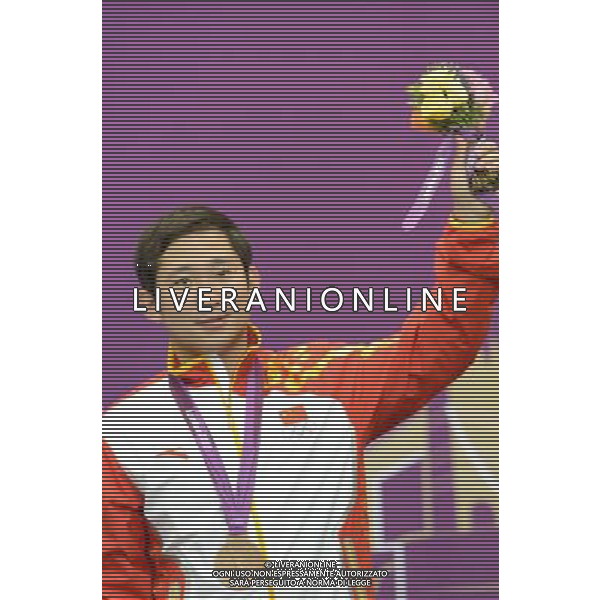 (120803) -- LONDON, Aug. 3, 2012 () -- Bronze medalist Ding Feng of China celebrates during victory ceremony of men\'s shooting 25m rapid fire pistol contest, at London 2012 Olympic Games in London, Britain, on August 3, 2012. (/Yang Zongyou) (nxl) ©PHOTOSHOT/Agenzia Aldo Liverani Sas - ITALY ONLY - GIOCHI OLIMPICI, OLIMPIADI LONDRA 2012