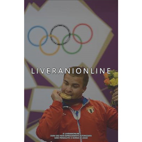 (120803) -- LONDON, Aug. 3, 2012 () -- Gold medalist Leuris Pupo of Cuba celebrates during victory ceremony of men\'s shooting 25m rapid fire pistol contest, at London 2012 Olympic Games in London, Britain, on August 3, 2012. Leuris Pupo of Cuba won gold medal. (/Yang Zongyou) (nxl) ©PHOTOSHOT/Agenzia Aldo Liverani Sas - ITALY ONLY - GIOCHI OLIMPICI, OLIMPIADI LONDRA 2012