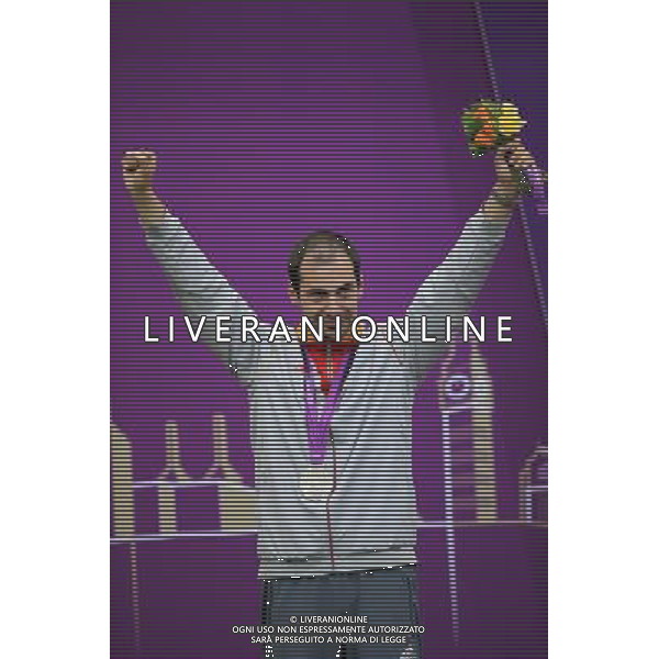 (120803) -- LONDON, Aug. 3, 2012 () -- Silver medalist Lionel Cox of Belgium poses for pictures during victory ceremony of men\'s shooting 50m rifle prone competition, at London 2012 Olympic Games in London, Britain, on August 3, 2012. (/Yin Gang) (nxl) ©PHOTOSHOT/Agenzia Aldo Liverani Sas - ITALY ONLY - GIOCHI OLIMPICI, OLIMPIADI LONDRA 2012