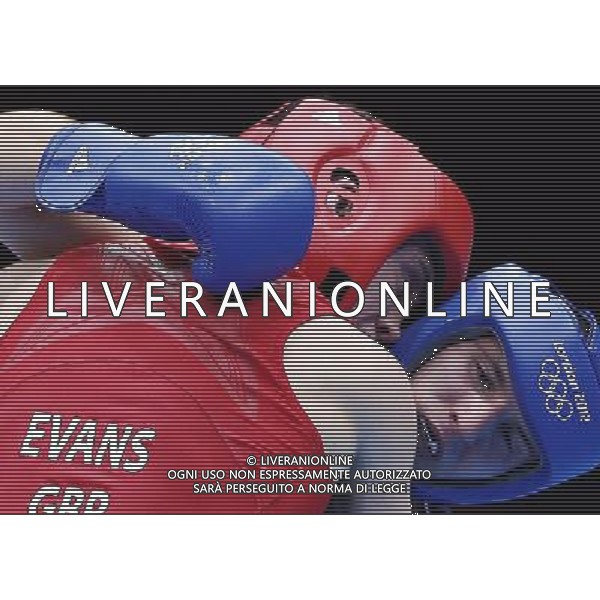 (120803) -- LONDON, Aug. 3, 2012 () -- Freddie Evans (red) of Britain competes with Egidijus Kavaliauskas of Lithuania during the round of 16 match of men\'s welter (69kg) boxing event at London 2012 Olympic Games, London, Britain, Aug. 3, 2012. Freddie Evans won the match 11-7 and advanced to quarterfinals. (/Wang Shen) ©PHOTOSHOT/Agenzia Aldo Liverani Sas - ITALY ONLY - GIOCHI OLIMPICI, OLIMPIADI LONDRA 2012