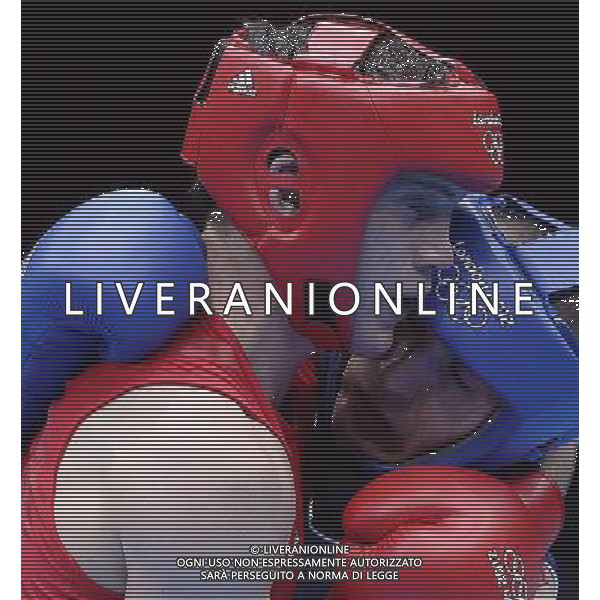 (120803) -- LONDON, Aug. 3, 2012 () -- Freddie Evans (red) of Britain competes with Egidijus Kavaliauskas of Lithuania during the round of 16 match of men\'s welter (69kg) boxing event at London 2012 Olympic Games, London, Britain, Aug. 3, 2012. Freddie Evans won the match 11-7 and advanced to quarterfinals. (/Wang Shen) ©PHOTOSHOT/Agenzia Aldo Liverani Sas - ITALY ONLY - GIOCHI OLIMPICI, OLIMPIADI LONDRA 2012