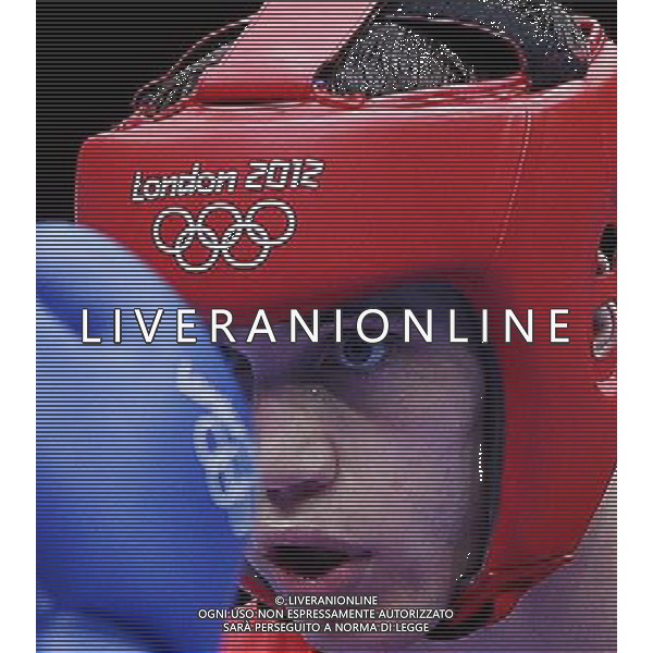 (120803) -- LONDON, Aug. 3, 2012 () -- Freddie Evans (red) of Britain competes with Egidijus Kavaliauskas of Lithuania during the round of 16 match of men\'s welter (69kg) boxing event at London 2012 Olympic Games, London, Britain, Aug. 3, 2012. Freddie Evans won the match 11-7 and advanced to quarterfinals. (/Wang Shen) ©PHOTOSHOT/Agenzia Aldo Liverani Sas - ITALY ONLY - GIOCHI OLIMPICI, OLIMPIADI LONDRA 2012