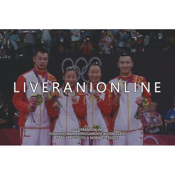 (120803) -- LONDON, Aug. 3, 2012 () -- Gold medalsits Zhang Nan (1st R) and Zhao Yunlei (2nd R) of China, silver medalists Xu Chen (1st L), Ma Jin of China, pose during victory ceremony of badminton mixed doubles competition, at London 2012 Olympic Games in London, Britain, on August 3, 2012. (/Ren Zhenglai) (nxl) ©PHOTOSHOT/Agenzia Aldo Liverani Sas - ITALY ONLY - GIOCHI OLIMPICI, OLIMPIADI LONDRA 2012