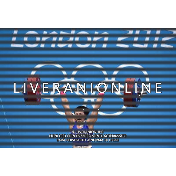 (120803) -- LONDON, Aug. 3, 2012 () -- Svetlana Podobedova of Kazakhstan competes during the women\'s 75kg weightlifting event at London 2012 Olympic Games, London, Britain, Aug. 3, 2012. Svetlana Podobedova claimed the gold medal of the event and set a new Olympic Record of clean and jerk of this event with a weight of 161kg. (/Gong Lei) ©PHOTOSHOT/Agenzia Aldo Liverani Sas - ITALY ONLY - GIOCHI OLIMPICI, OLIMPIADI LONDRA 2012