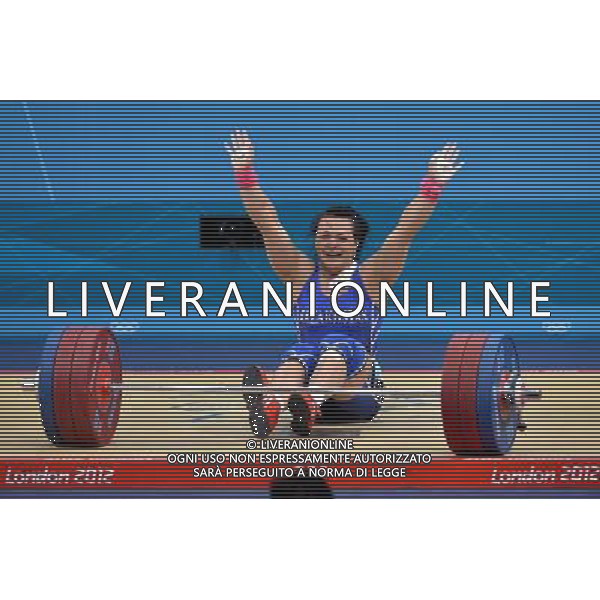 (120803) -- LONDON, Aug. 3, 2012 () -- Svetlana Podobedova of Kazakhstan celebrates during the women\'s 75kg weightlifting event at London 2012 Olympic Games, London, Britain, Aug. 3, 2012. Svetlana Podobedova claimed the gold medal of the event and set a new Olympic Record of clean and jerk of this event with a weight of 161kg. (/Gong Lei) ©PHOTOSHOT/Agenzia Aldo Liverani Sas - ITALY ONLY - GIOCHI OLIMPICI, OLIMPIADI LONDRA 2012
