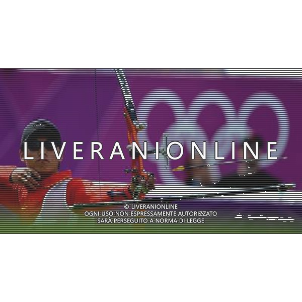 (120803) -- LONDON, Aug. 3, 2012 () -- China\'s Dai Xiaoxiang shoots during men\'s individual bronze medal match of archery between China\'s Dai Xiaoxiang and Rick van de Ven of Netherlands, at London 2012 Olympic Games in London, Britain, August 3, 2012. Dai Xiaoxiang won the bronze medal. (/Gesang Dawa) (zgp) ©PHOTOSHOT/Agenzia Aldo Liverani Sas - ITALY ONLY - GIOCHI OLIMPICI, OLIMPIADI LONDRA 2012