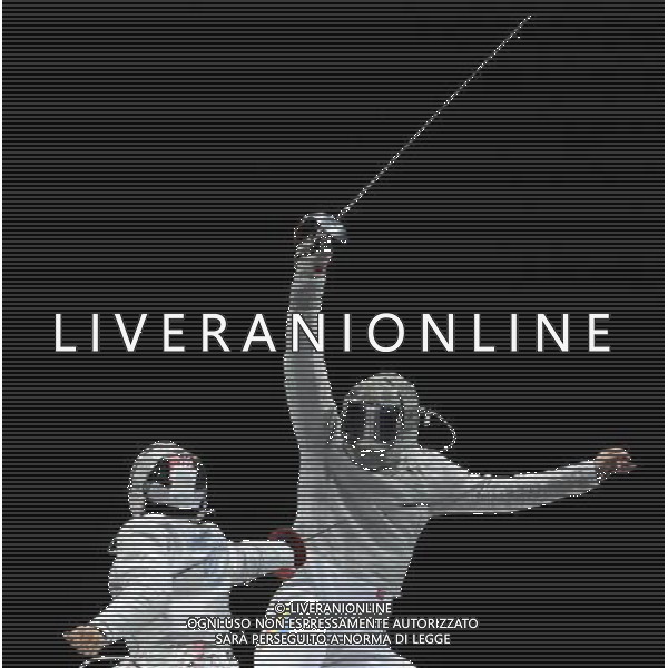 (120803) -- LONDON, Aug. 3, 2012 () -- Kim Junghwan (L) of South Korea competes with Tiberiu Dolniceanu of Romania during the gold medal match of men\'s team Sabre Fencing event between South Korea and Romania at London 2012 Olympic Games, London, Britain, Aug. 3, 2012. Team South Korea won the gold medal of the event. (/Zeng Yi) ©PHOTOSHOT/Agenzia Aldo Liverani Sas - ITALY ONLY - GIOCHI OLIMPICI, OLIMPIADI LONDRA 2012